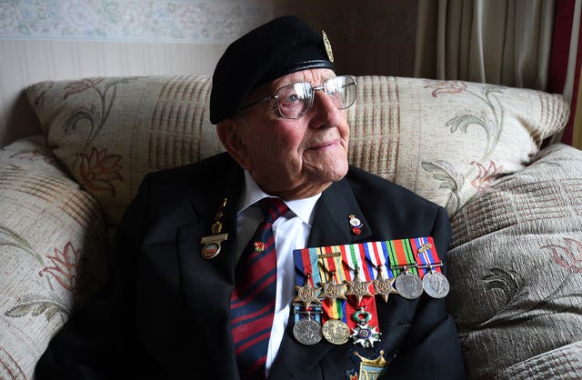 Don Sheppard wearing his campaign medals at his home in Basildon