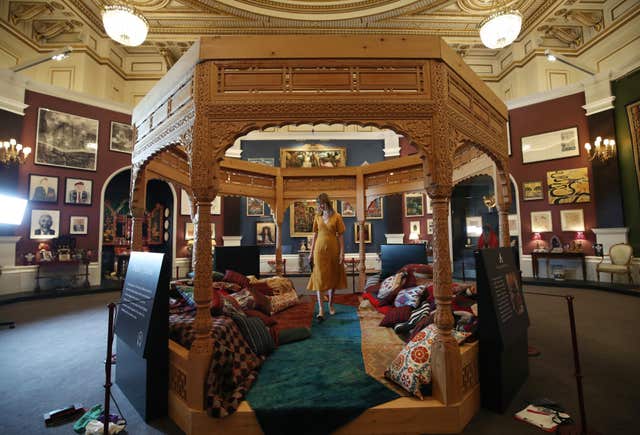 Made of cedar wood, the pavilion is filled with textiles from Wales