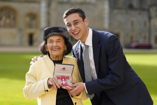 Holocaust survivor Lily Ebert poses for a photograph with her great-grandson Dov Forman