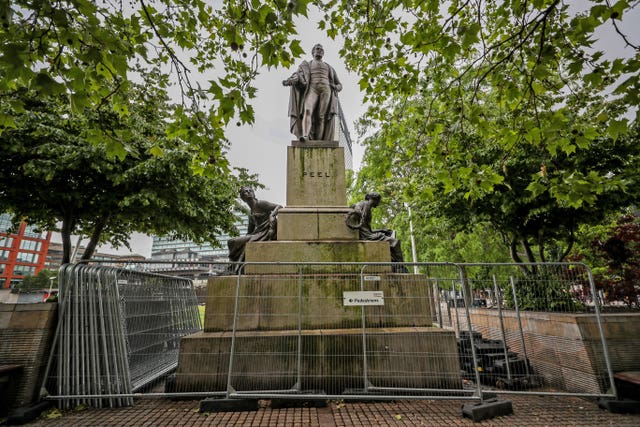 A statue of two-time British prime minister Sir Robert Peel in Piccadilly Gardens, Manchester 