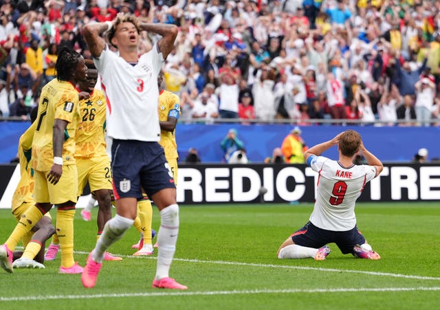 Harry Kane reacts to missing a late chance against Ghana