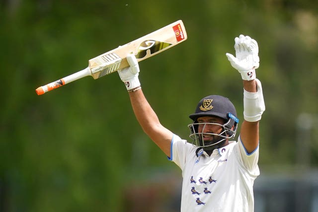 Sussex’s Cheteshwar Pujara celebrates his century