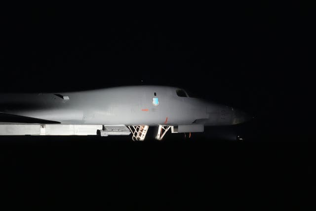 A US bomber spot-lit in the dark