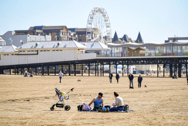 People relax on the beach at Weston-super-Mare, Somerset (Ben Birchall/PA)