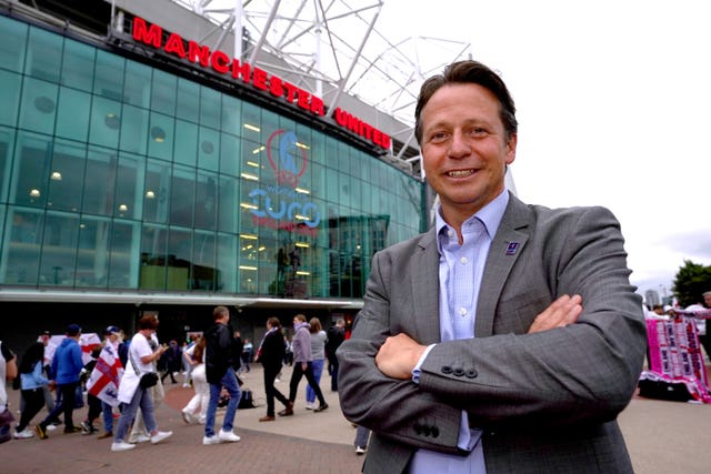 Nigel Huddleston outside Old Trafford before the opening game between England and Austria