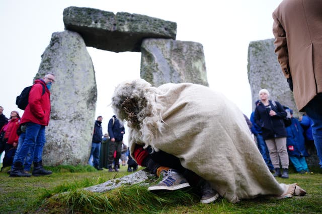 Thousands of people took part in the winter solstice at Stonehenge (Ben Birchall/PA)