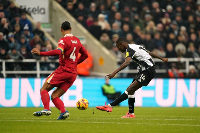 Alexander Isak fires in the opening goal as Virgil van Dijk tries in vain to stop him