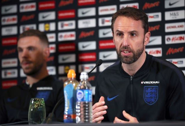 England manager Gareth Southgate (right) and Jordan Henderson face the media (Nick Potts/PA)