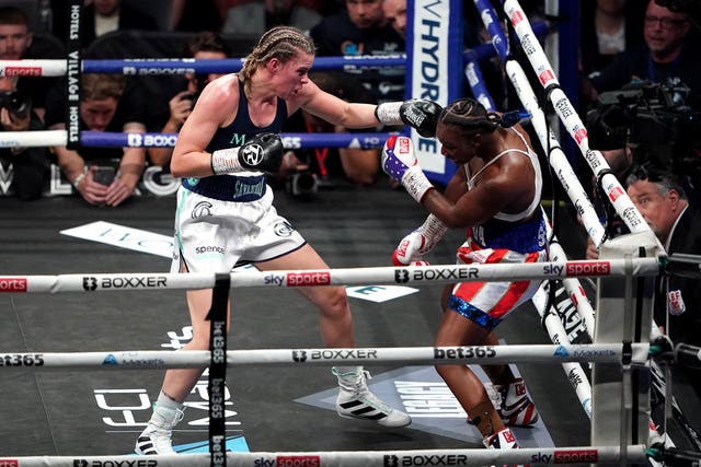 Savannah Marshall, left, puts Claressa Shields on the ropes