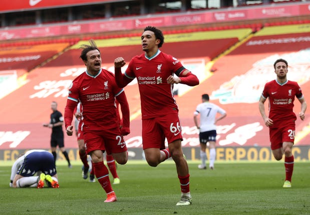 Trent Alexander-Arnold (centre) celebrates