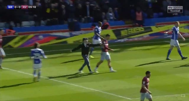 Jack Grealish was punched by a spectator who ran on to the pitch less than 10 minutes into the match