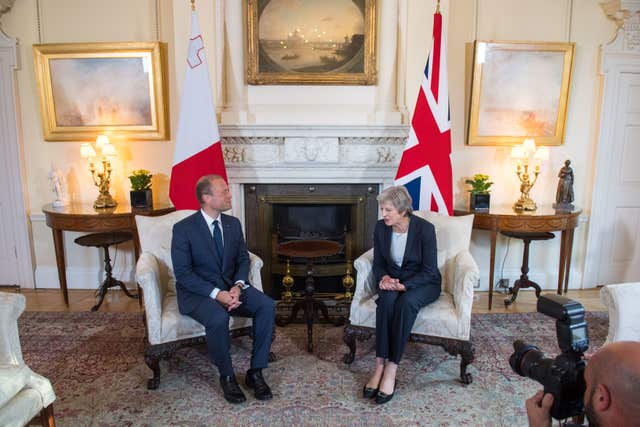 Theresa May discussed the Chequers plan with Maltese counterpart Joseph Muscat (Dominic Lipinski/PA)