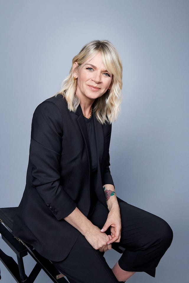 Zoe Ball sitting down