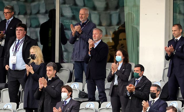 Chelsea owner Roman Abramovich (centre) spoke to the players after Sunday's game (Adam Ishe/PA).