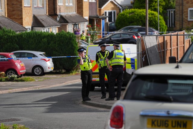 Police at the scene in Ashlyn Close, Bushey, Hertfordshire