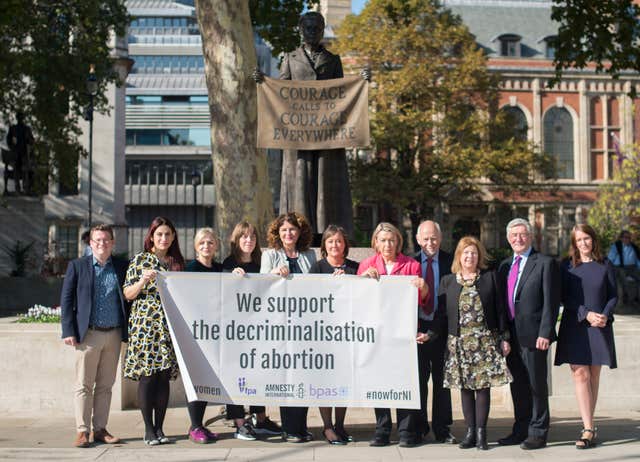 MP Diana Johnson, fifth left, with a cross-party group of MPs and co-sponsors by the statue of Millicent Fawcett in Parliament Square