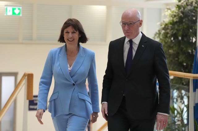 Rachel Reeves and John Swinney walking side-by-side