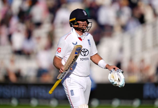 England’s Joe Root walks from the field