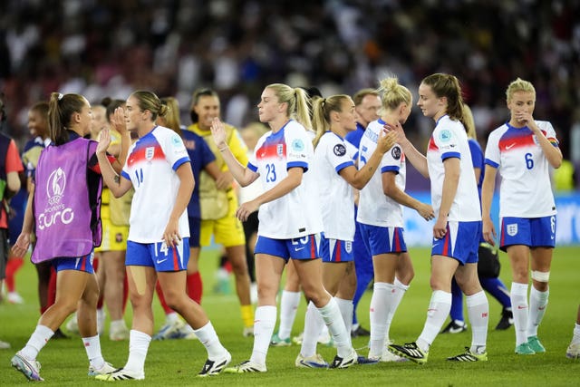England's players react after their game against France