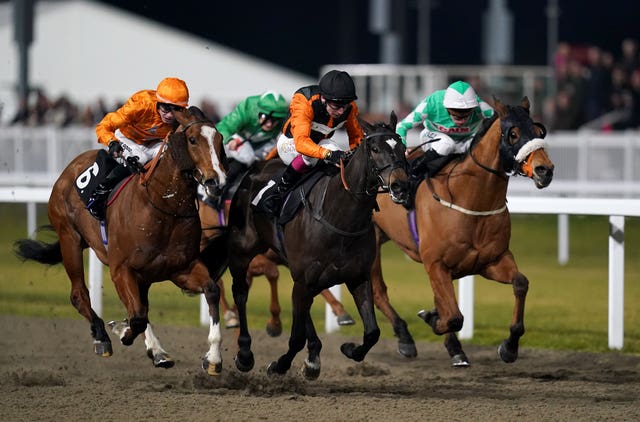 Jupiter Express and Oisin Murphy (centre) coming home to win the Winning Connections Networking Handicap at Chelmsford City Racecourse 