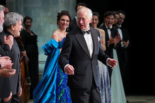 Charles on stage with the cast of a special Gala performance at the Royal Opera House in 2024 