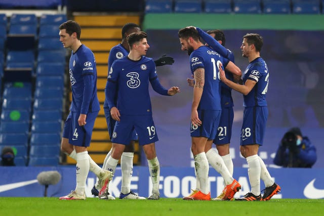 Olivier Giroud, centre, celebrates his goal
