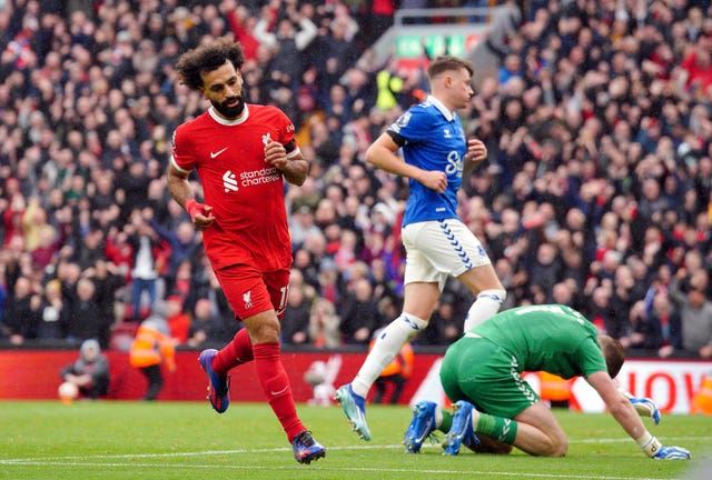 Liverpool’s Mohamed Salah scores against Everton