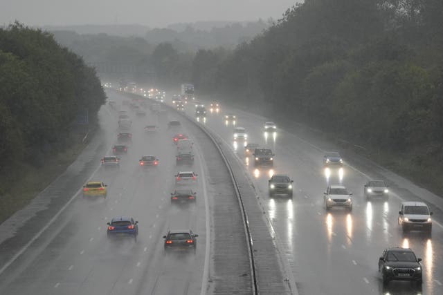 Traffic on the M3 motorway near Basingstoke during wet weather