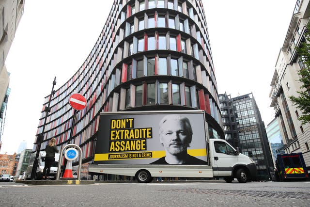 A mobile advertising board with a “Don’t Extradite Assange” message outside the Old Bailey, London (Aaron Chown/PA)