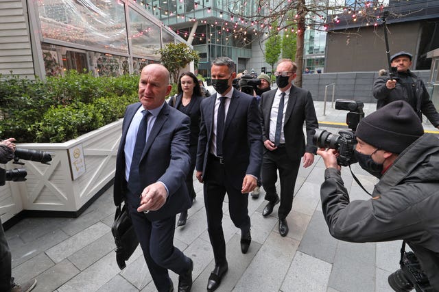 Ryan Giggs, centre, has denied charges of assaulting two women and controlling or coercive behaviour