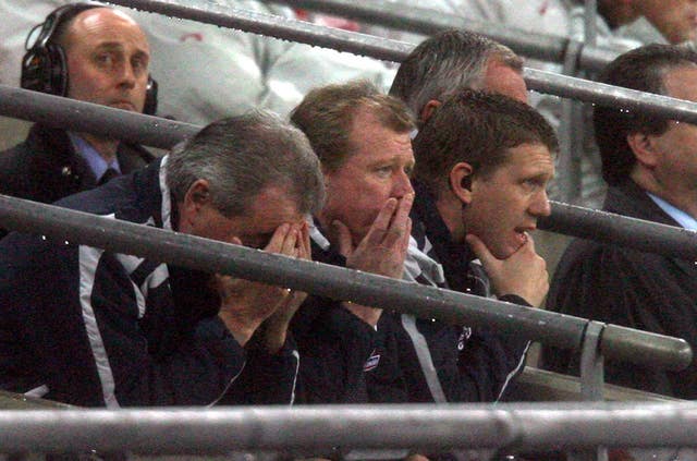 The England bench react during the defeat by Croatia