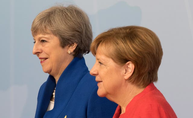 Mrs May visited Berlin for talks with German Chancellor Angela Merkel on Friday (Matt Cardy/PA)