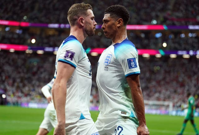 England’s Jordan Henderson celebrates with Jude Bellingham