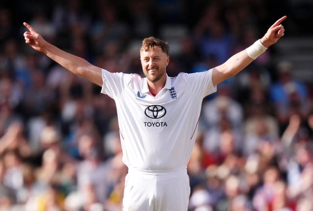 Ollie Robinson celebrates completing a five-wicket haul
