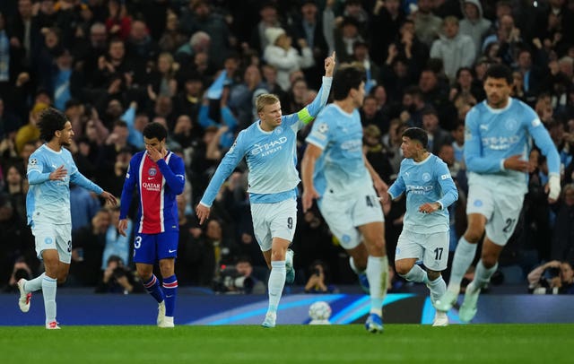 Erling Haaland celebrates after scoring for Manchester City
