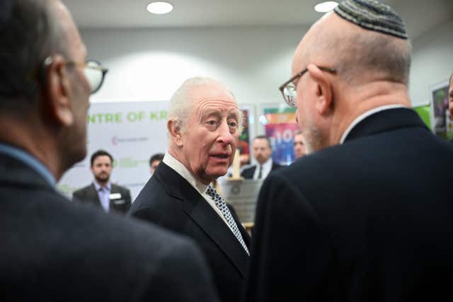 The King during his visit to the Jewish Community Centre in Krakow (Victoria Jones/PA)