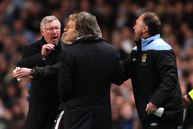 Sir Alex Ferguson and Roberto Mancini face off