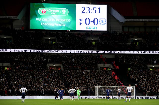 Players await the VAR decision at Wembley