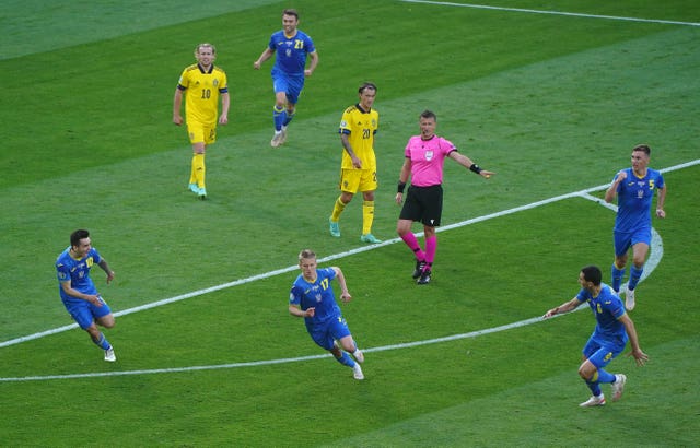 Oleksandr Zinchenko celebrates scoring for Ukraine at Euro 2020 