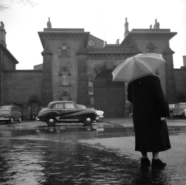 A protester prays outside Wandsworth Prison when the death penalty was on force (PA)