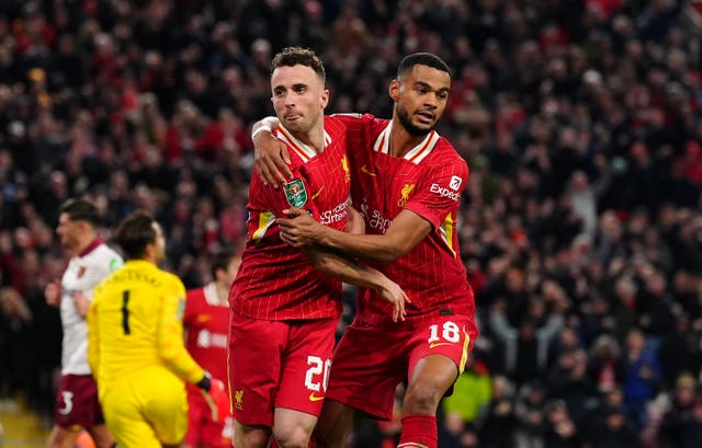 Jota and Cody Gakpo, right, celebrate Liverpool's second goal at Anfield