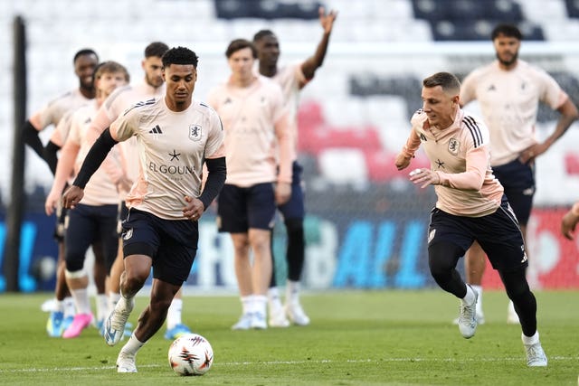 Aston Villa’s Ollie Watkins (left) and Lucas Digne train ahead of the final 