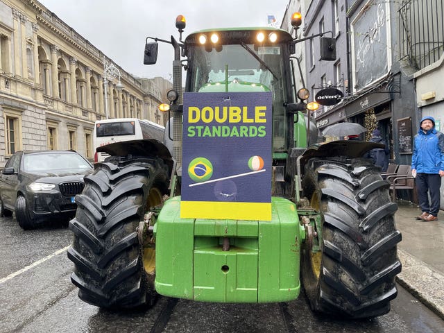 Fifteen tractors park along Kildare Street in Dublin near Leinster House as part of the Irish Farmers’ Association’s call for Bord Bia’s chairman to resign