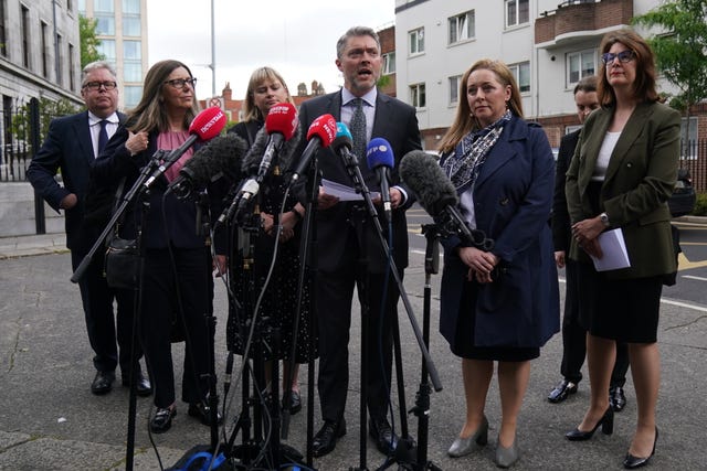 Representatives from the BBC speak outside Dublin High Court