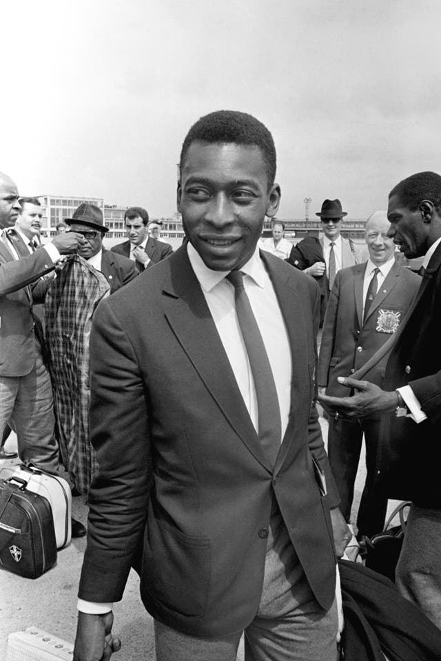 Pele arrives at Manchester Airport ahead of the 1966 World Cup. He scored Brazil's opening goal as they began a disappointing tournament in positive fashion with a 2-0 win over Bulgaria at Everton's Goodison Park stadium