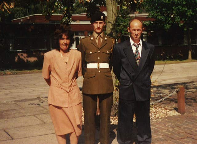 Sean Benton with his parents