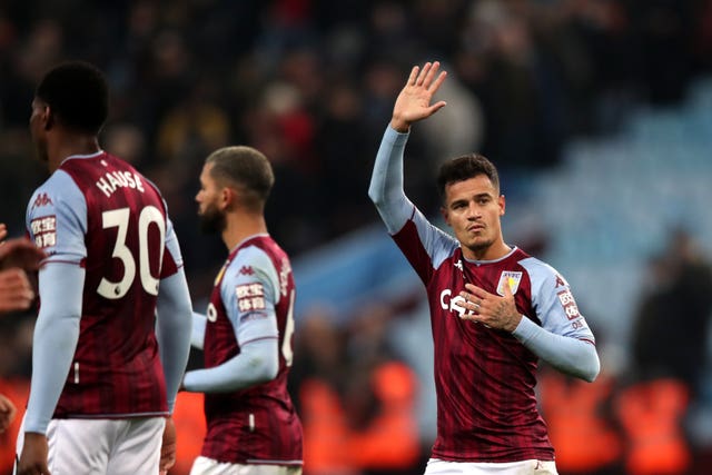 Philippe Coutinho applauds the fans