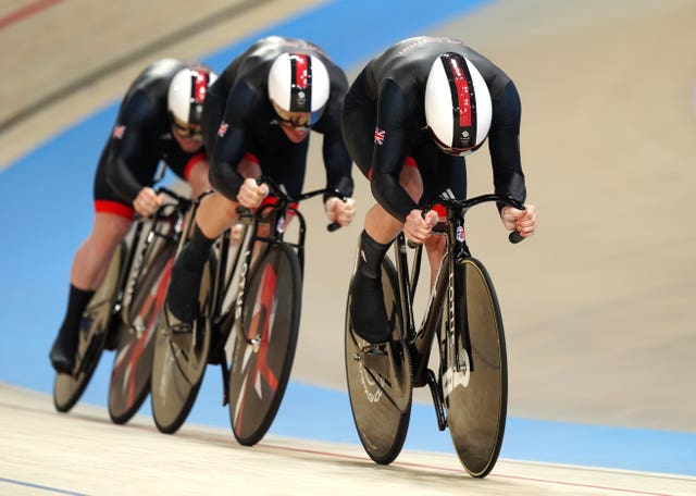 The British side in action in the men's team sprint