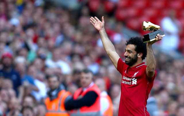 Mohamed Salah celebrates with the Golden Boot after the 2017-18 season