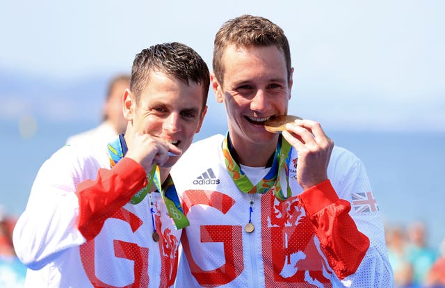 Jonny Brownlee, left, hopes big brother Alistair will join him at the Tokyo Olympics